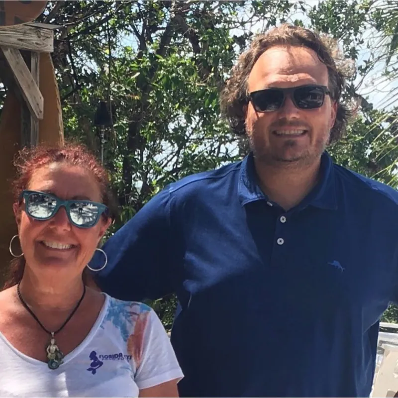 a couple of people posing for the camera