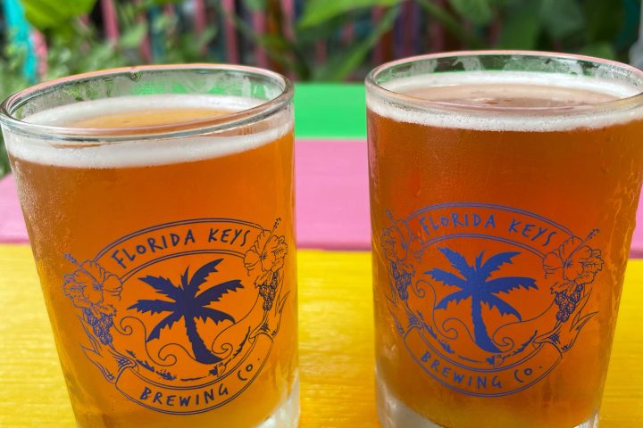 two glasses of florida keys craft beer on a table
