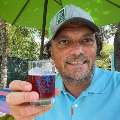 florida keys food tour guide craig with beer at brewery