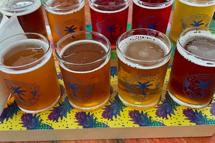 a cup of beer on a table