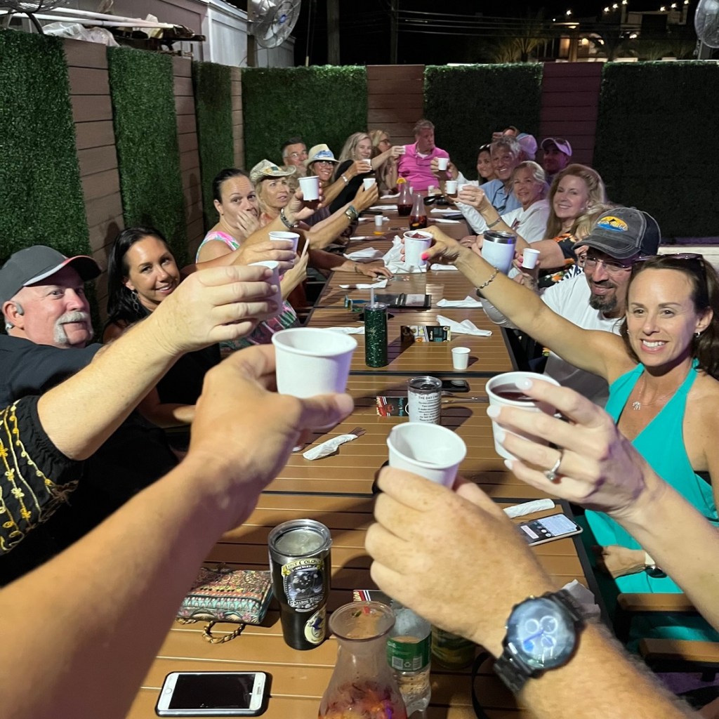 a group of people sitting at a table