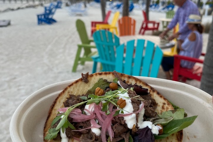 a plate of food with a sandwich and a salad