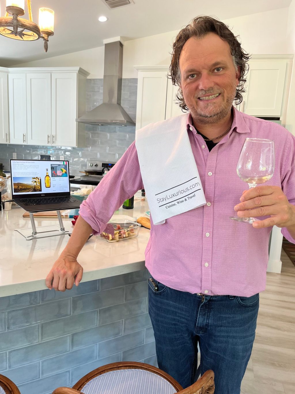 a person holding a wine glass